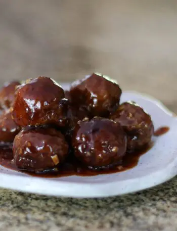 grape jelly meatballs on a plate