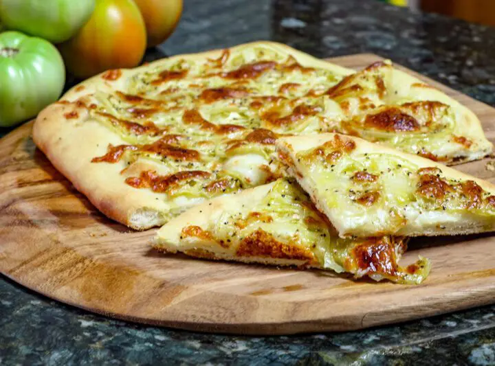 green tomato pizza on homemade crust