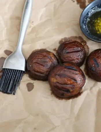 grilled mushrooms with basting sauce and brush