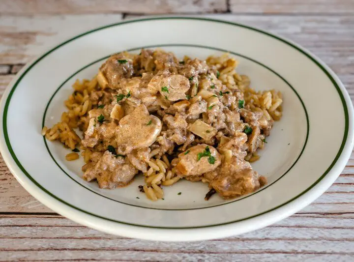 ground beef stroganoff over rice with sour cream sauce and mushrooms