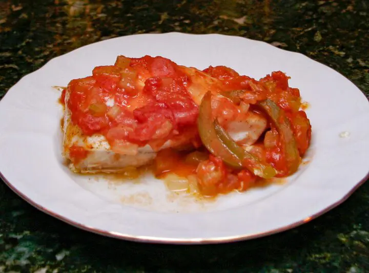 halibut with creole sauce on a plate