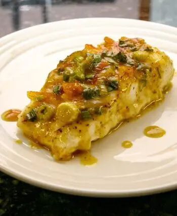 Halibut with a green onion and curry topping