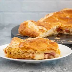 puff pastry tart with ham, gruyere cheese, and fig jam