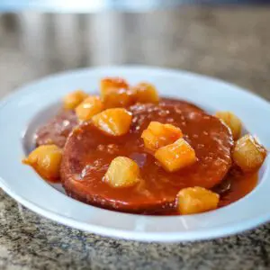 ham steaks with pineapple on a platter