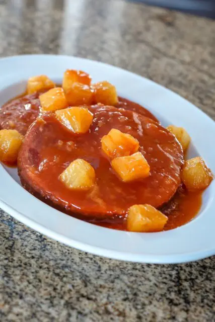 ham steaks with pineapple on a platter