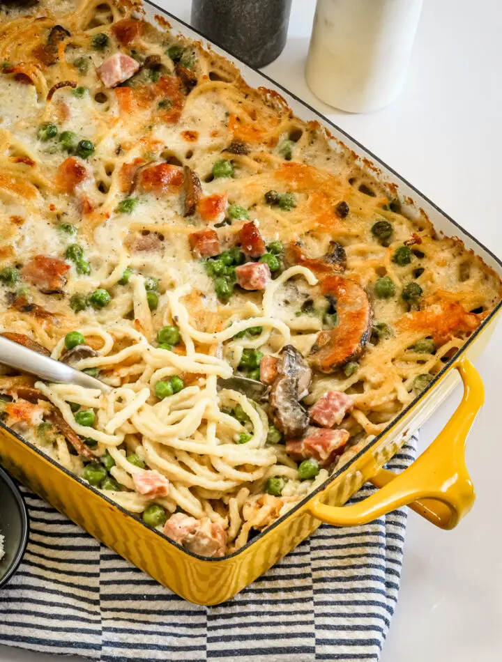 Ham tetrazzini in the baking dish being served.