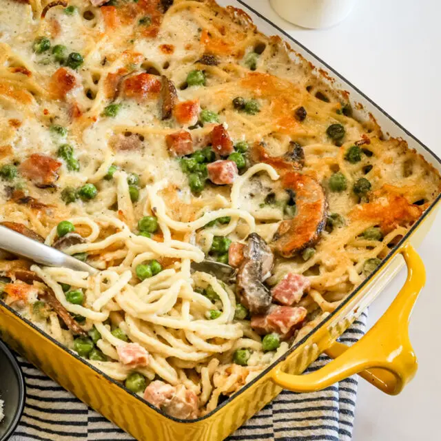 Ham tetrazzini in the baking dish being served.