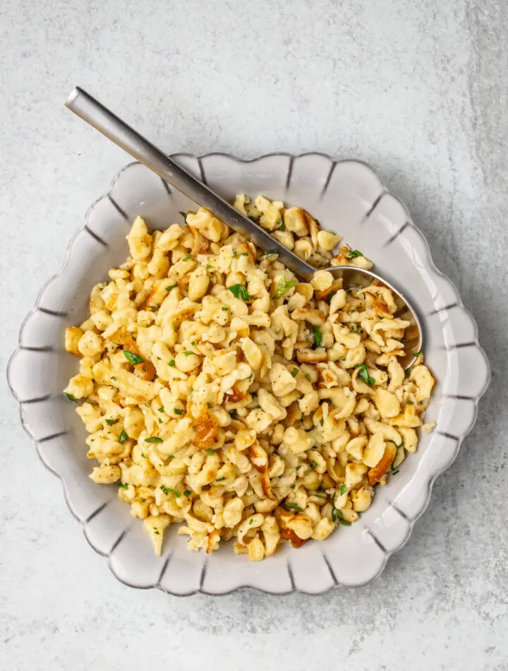 A plate of homemade spaetzle sautéed with butter.