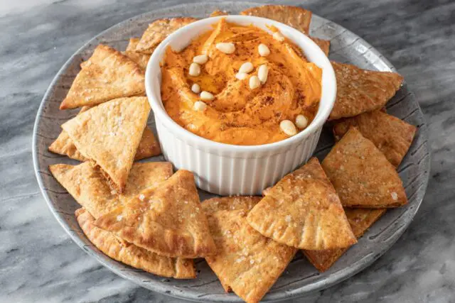 homemade pita chips with a hummus dip