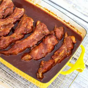 honey garlic ribs in a baking pan