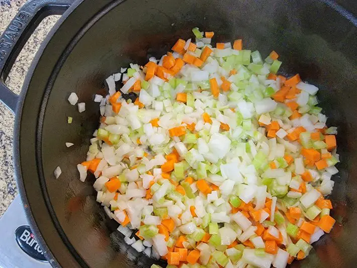 hot dog chowder preparation, carrots, onions, and celery.