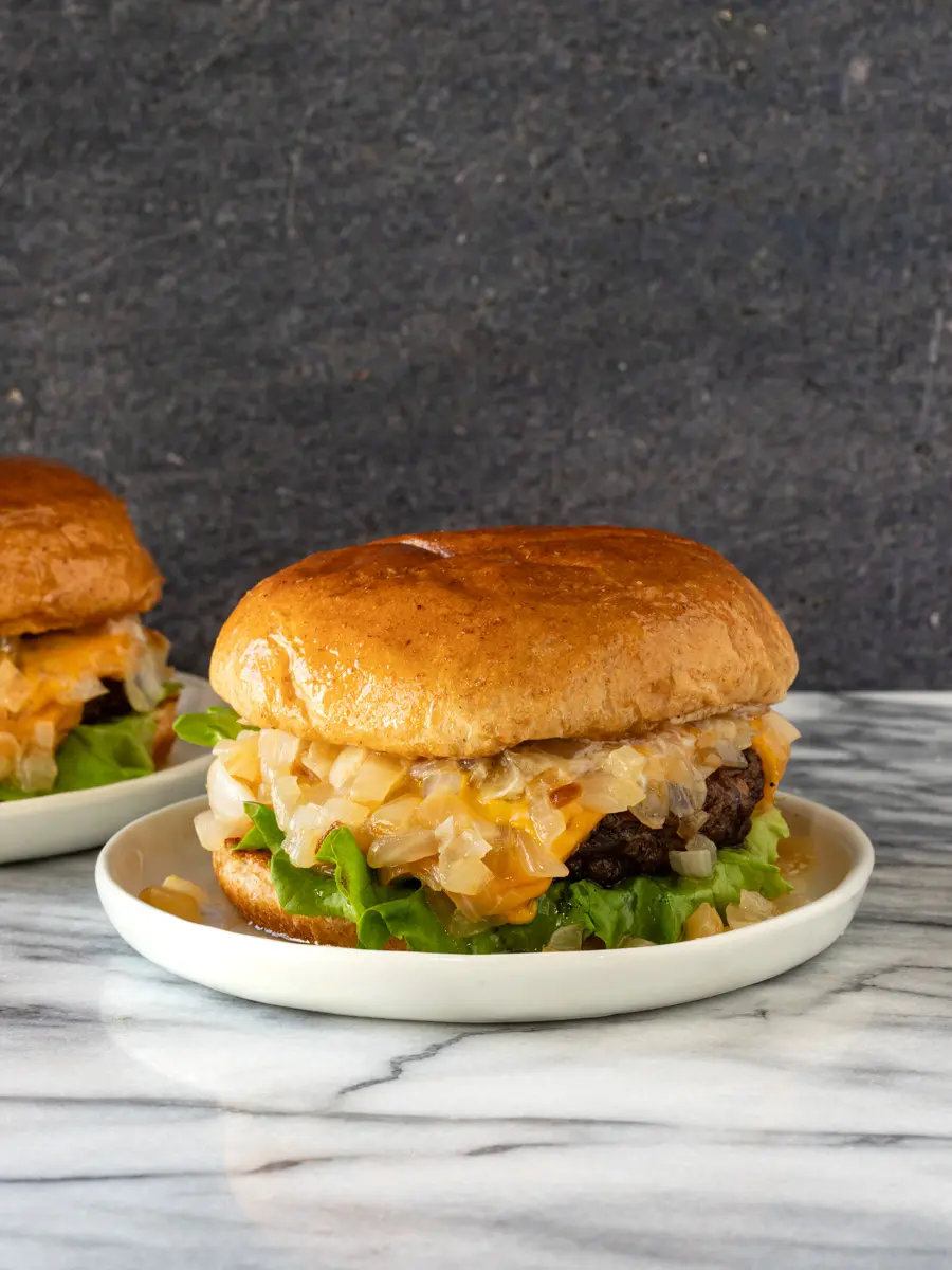 A delicious, buttery Wisconsin butter burger with sauteed onions, lettuce, and cheese.