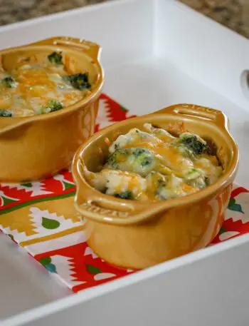 broccoli, rice, and cheese casseroles baked in mini cocottes