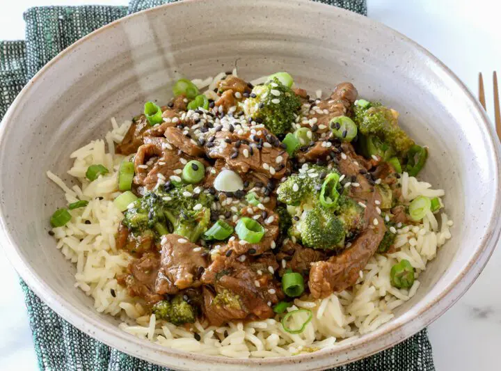 instant pot beef and broccoli in a bowl on rice