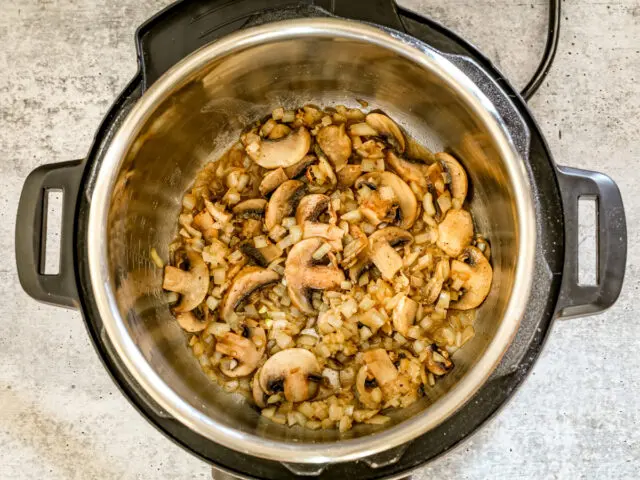 Sautéing the mushrooms for Instant Pot beef stroganoff.