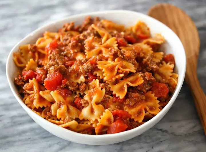 instant pot beef and farfalle in a serving bowl