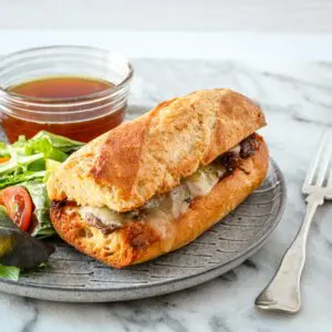 french dip sandwich on a plate