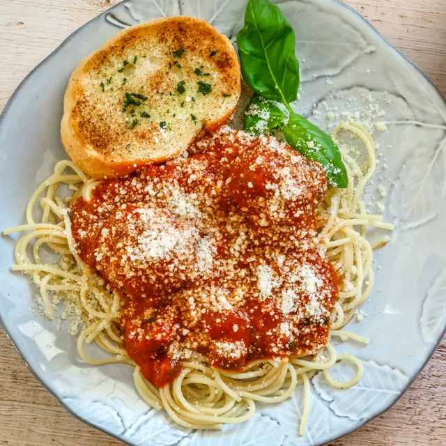 Pressure-cooked meatballs and sauce finished with pasta.