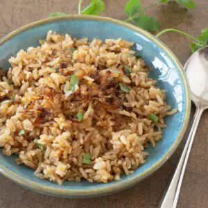 a bowl of parsi rice cooked in the instant pot