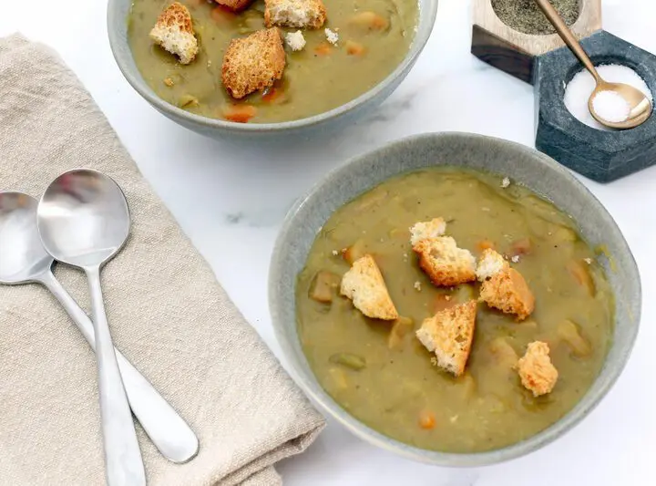 instant pot pea soup in bowls with croutons