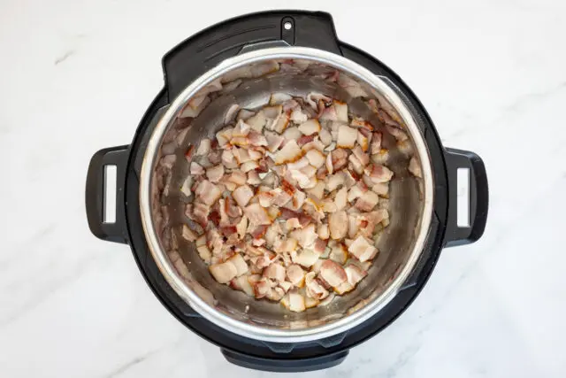 Sauté the bacon in the Instant Pot.