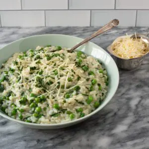 instant pot risotto served with extra parmesan cheese