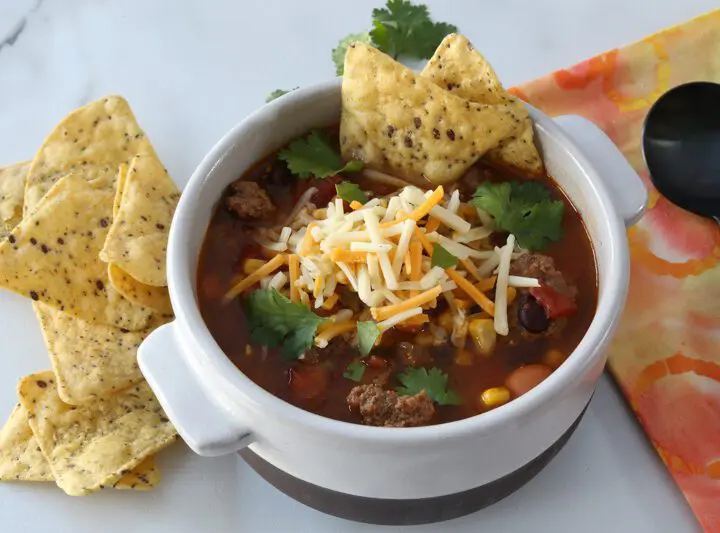 instant pot taco soup with tortilla chops and cheese