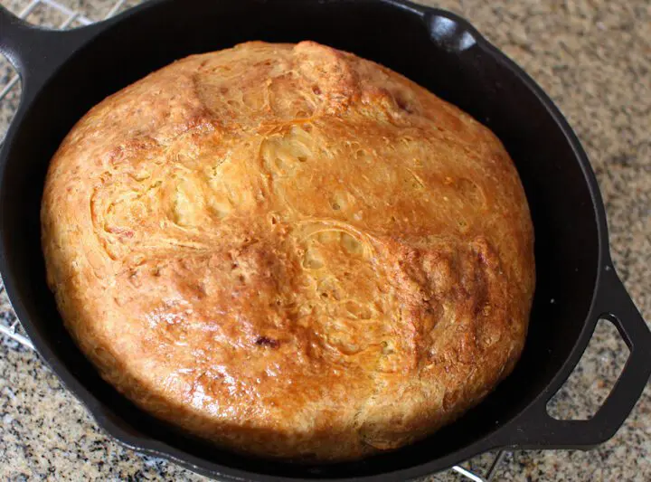 irish soda bread baked in a cast iron pan