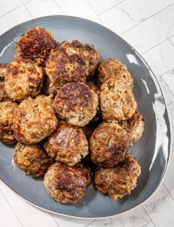 A serving plate with Italian meatballs.