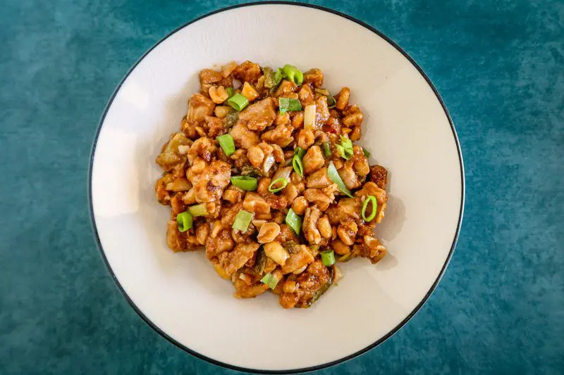 stir-fried kung pao chicken in a bowl