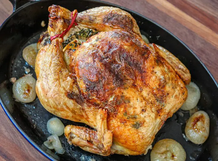 A perfectly roasted Sunday dinner chicken with lemon and herbs