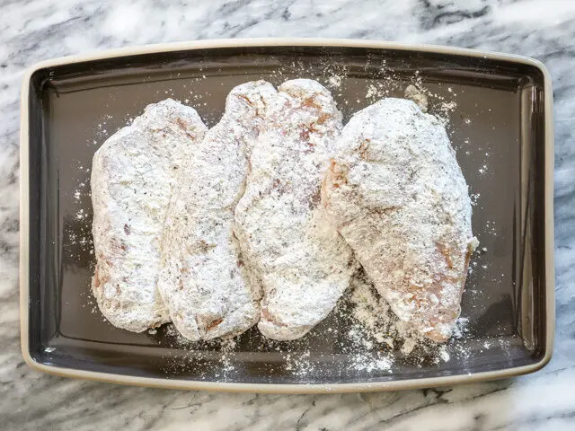 flour coated chicken breasts