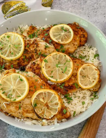 lemon pepper chicken in a serving dish