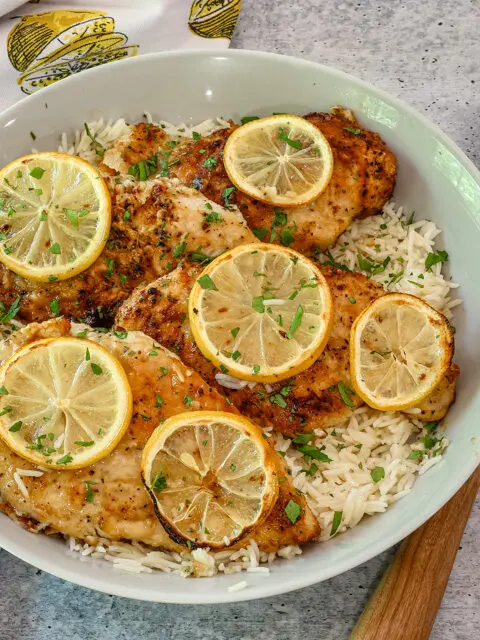 lemon pepper chicken in a serving dish