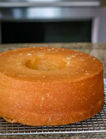 lemon pound cake on a cooling rack