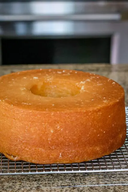 lemon pound cake on a cooling rack