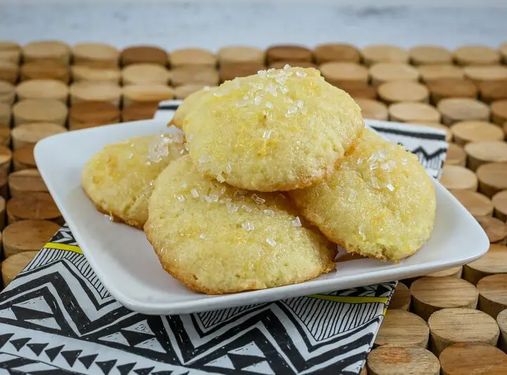 tea cakes on a plate with a lemon glaze and sparkling sugar