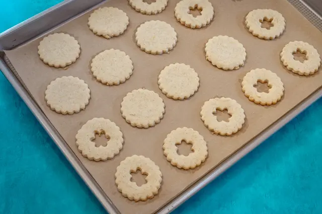 baking sheet with linzer cookies