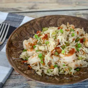 a plate of shrimp and rice, louisiana style