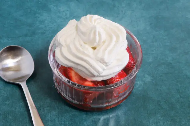 Macerated strawberries with vanilla chantilly cream.