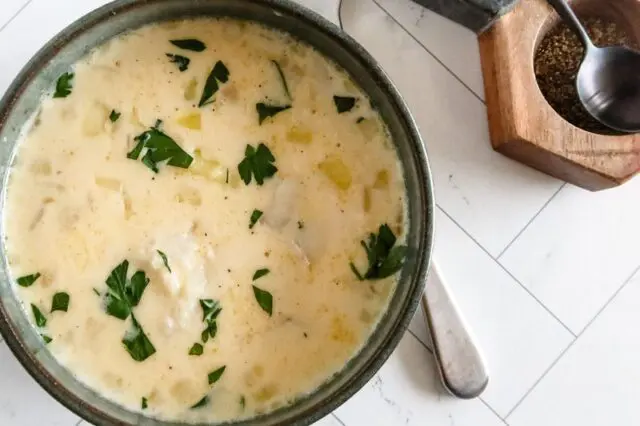 Delicious Maine haddock chowder with parsley garnish