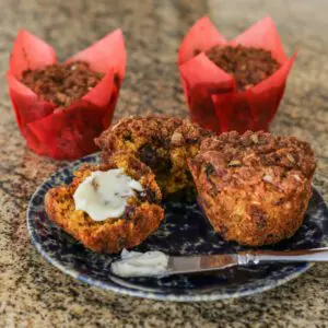 cream cheese spread with maple syrup shown on muffins.