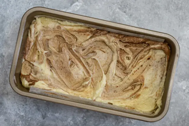 Marble pound cake loaf in the pan, ready to bake.