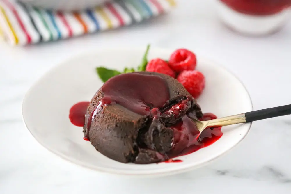 chocolate molten lava cake with raspberry sauce