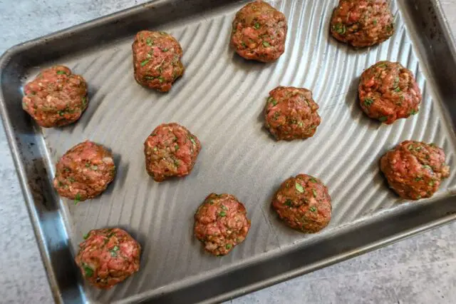 Shaping the meatballs/