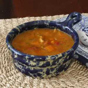 A bowl of Mulligatawny soup.