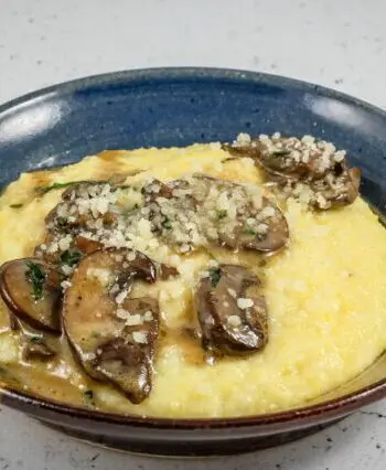 Sautéed mushrooms with butter and white wine over polenta.