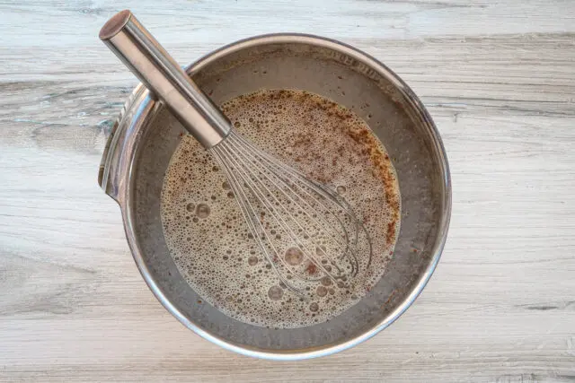 Whisk the eggs, milk, vanilla, and salt in a mixing bowl.