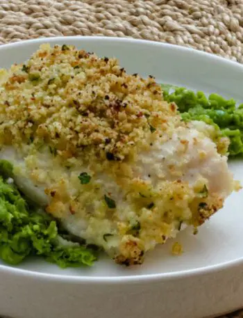 pea puree on a platewith a halibut filet