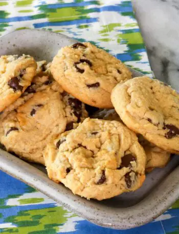 A small tray with baked peanut butter chocolate chip cookies.